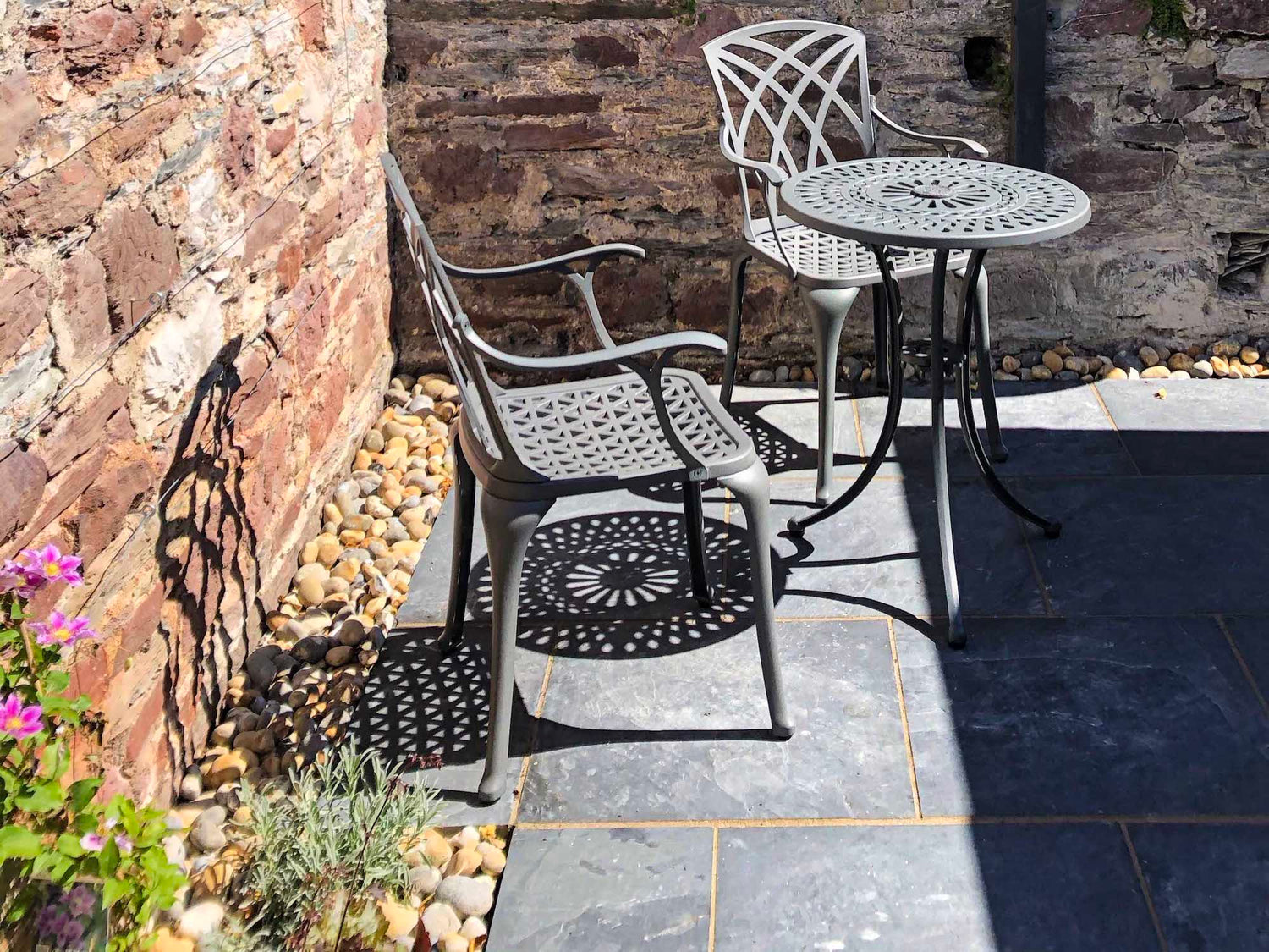 Can you put metal garden furniture on a stone patio?